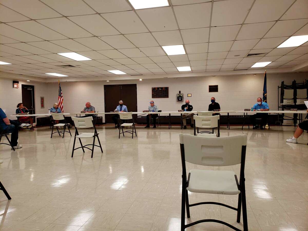 The Huron County Commissioners before this week's meeting at the Huron County Expo Center. The meeting was held there so people could observe social distancing and on Thursday due to scheduling conflicts. (Robert Creenan/Huron Daily Tribune)
