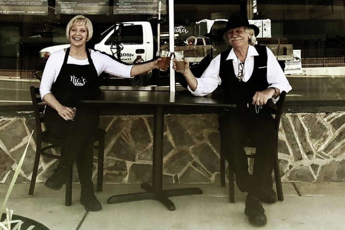 Lora Dobbs and Chris LeGate outside Nic's restaurant in Paradise, Calif.