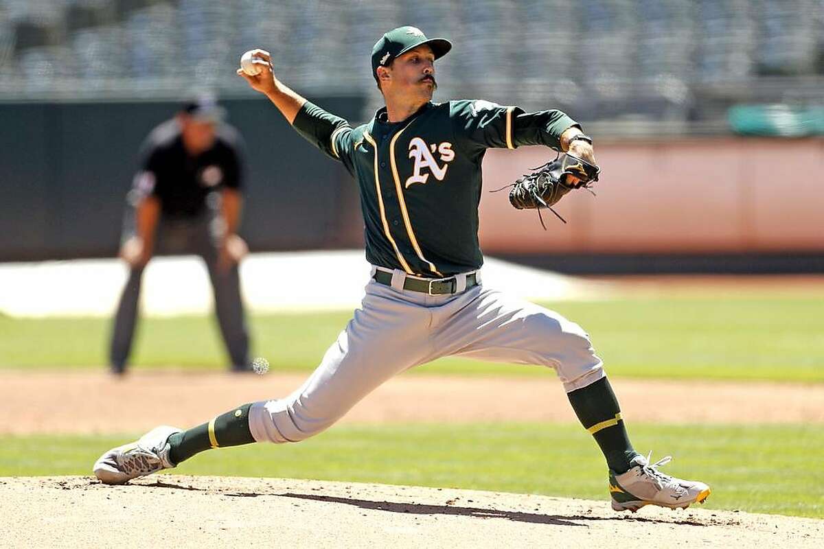 Oakland Athletics' Daniel Mengden pitches during simulated game at Oakland Coliseum in Oakland, Calif., on Sunday, July 12, 2020.