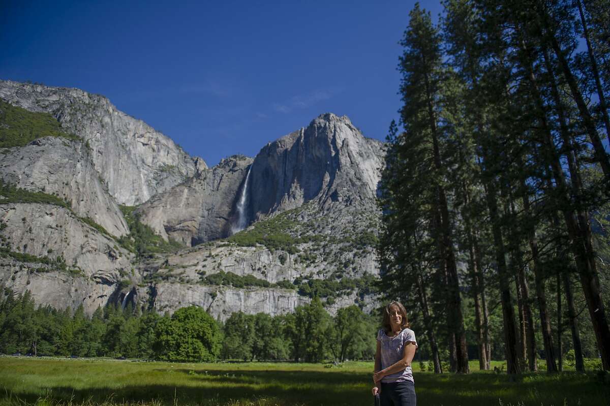 Susan Andaloro of Calabasas, Calif. looks over the Yosemite Valley at Yosemite National Park on Thursday, June 11, 2020.