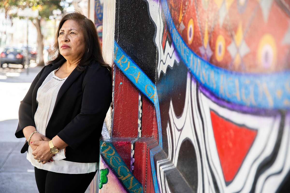 A portrait of Guillermina Castellanos outside the Women's Building on Saturday, July 11, 2020, in San Francisco, Calif. Castellanos, is the founder of the Women's Collective. She said many of her members, mostly nannies and housekeepers, are frightened of getting tested for the novel coronavirus because of the possibility of testing positive and being out of work. The city implemented the Right to Recovery program that will pay two weeks of minimum wage for people who test positive for the novel coronavirus.