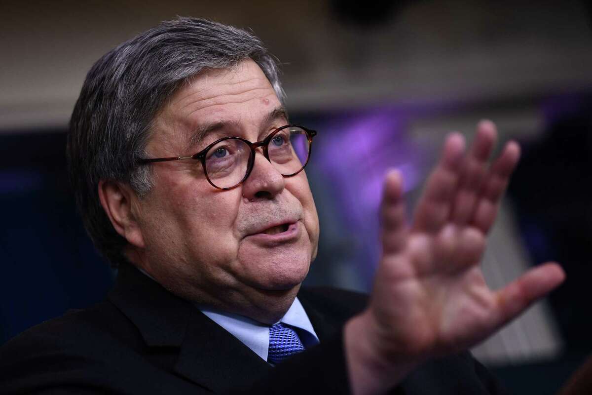 (FILES) In this file photo US Attorney General William Barr gestures as he speaks during the daily briefing on the novel coronavirus, COVID-19, at the White House, March 23, 2020, in Washington, DC. - US Attorney General Bill Barr blasted China on July 16, 2020 for mounting an "economic blitzkrieg" on global free markets in the latest broadside against Beijing from the Trump administration. Describing an ideological showdown, Barr said China was determined to replace and not just join advanced economic powers, and he warned US companies to stop compromising their principles to appease Chinese leaders and regulators. (Photo by Brendan Smialowski / AFP) (Photo by BRENDAN SMIALOWSKI/AFP via Getty Images)
