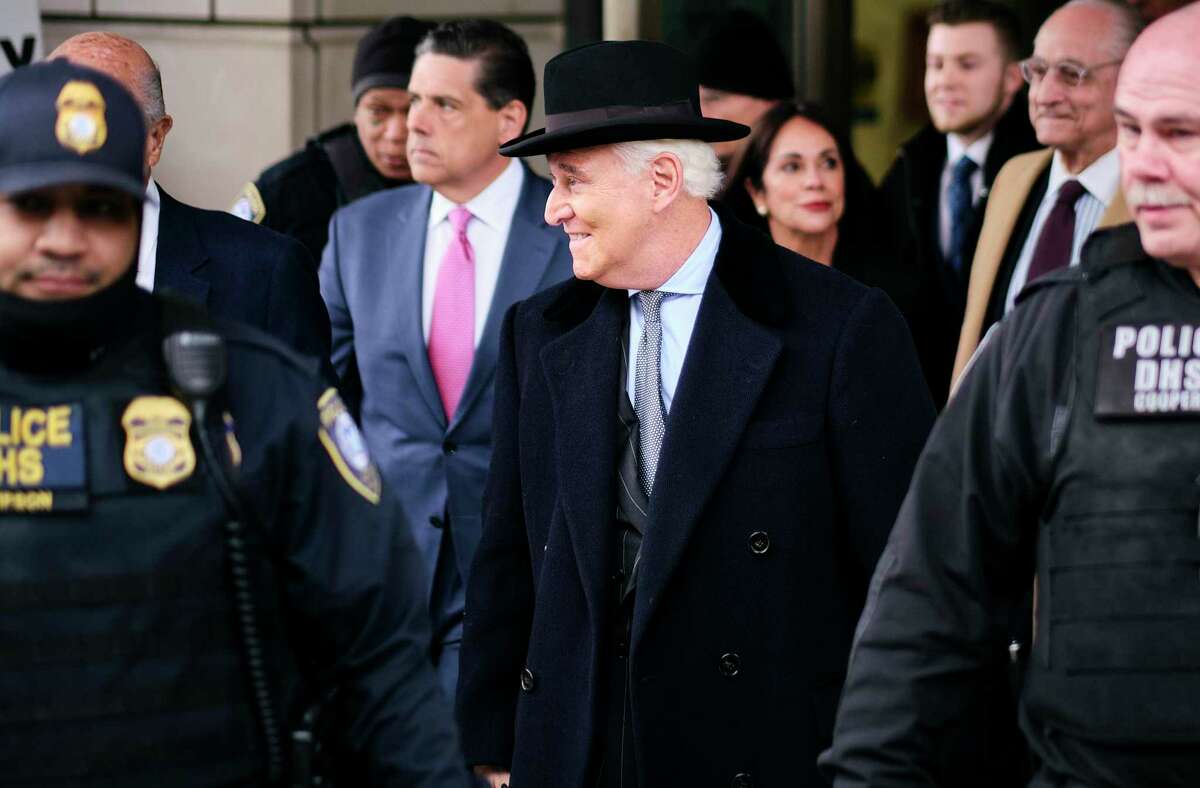 FILE -- Roger Stone, President Donald Trump's former adviser and longtime friend, departs a federal courthouse after his sentencing, in Washington, Feb. 20, 2020. Trump commuted Stone's sentence for seven felony crimes on July 10, according to the White House, days before Stone was to report to a federal prison to serve a 40-month term. (T.J. Kirkpatrick/The New York Times)