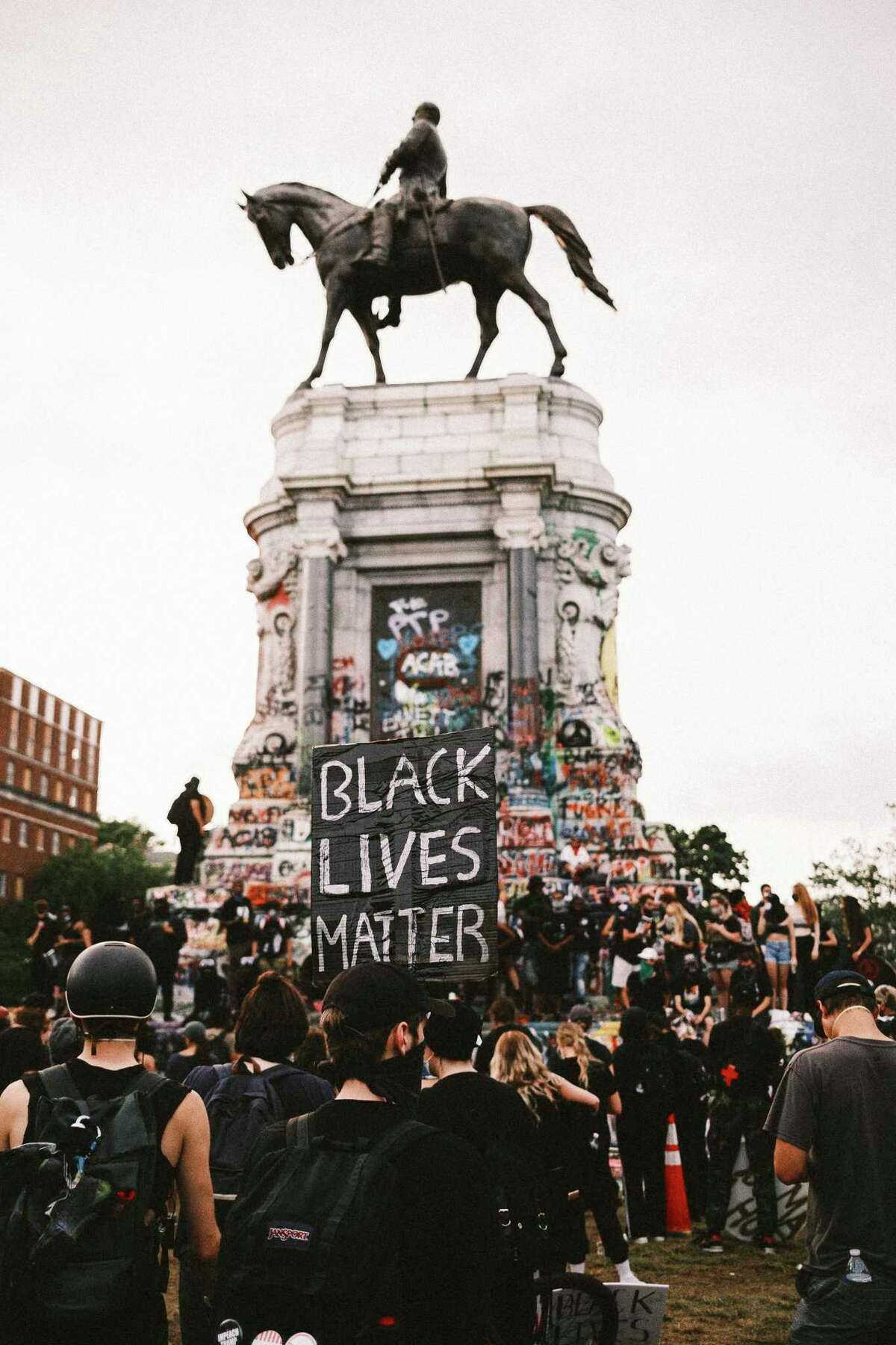 Protesters gather at the park with the Robert E. Lee Statue on June 23, 2020, in Richmond, Virginia. (Eze Amos/Getty Images/TNS)