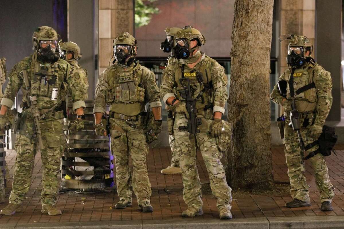 Federal Agents in green fatigues in Portland, OR.