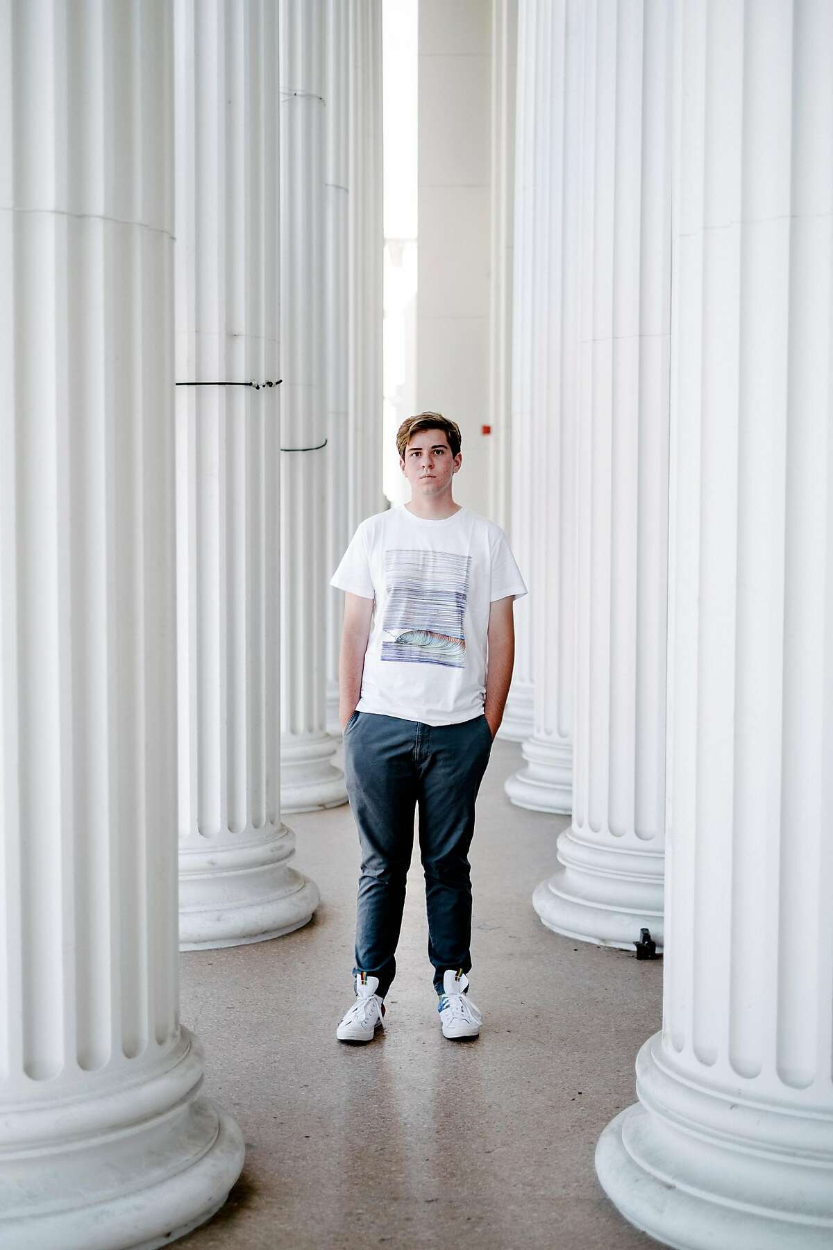 Henry Mills, who will be in the eleventh grade in the fall, stands for a portrait at Alameda High School in Alameda, Calif, on Thursday, July 16th, 2019.