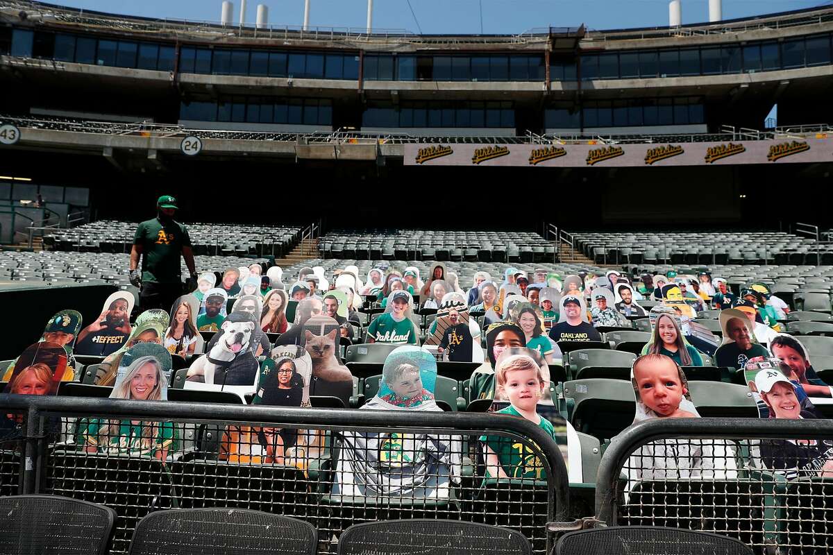 Oakland Athletics have placed cut out photos of season ticket holders in the seats around the lower bowl of Oakland Coliseum in Oakland, Calif., on Thursday, July 16, 2020.