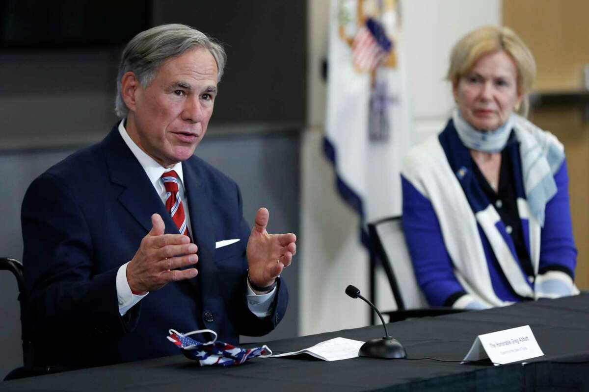 Texas Gov. Greg Abbott responds to question as Dr. Deborah Birx, White House coronavirus response coordinator, looks on during a news conference after Vice President Mike Pence met with Abbott and members of his healthcare team regarding COVID-19 at the University of Texas Southwestern Medical Center West Campus in Dallas, Sunday, June 28, 2020. (AP Photo/Tony Gutierrez)