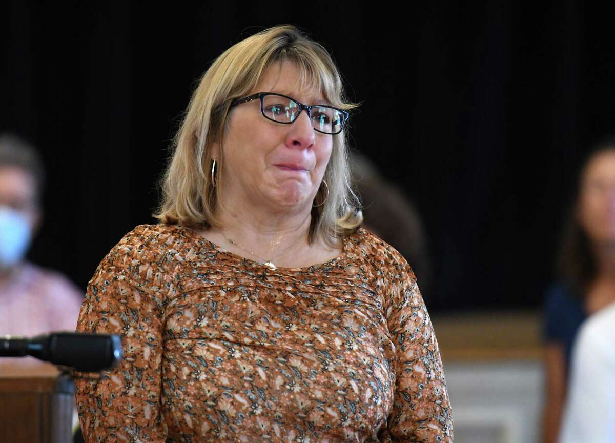 Beth Muldoon, who lost her son, Adam Jackson, and daughter in-law Abigail "Abby" King Jackson, in the Oct. 6, 2018 Schoharie limousine crash that killed 20 people, tears-up as a statement is read on her behalf during a press conference where family members voiced their disappointment and frustration to the plea bargain process in Nauman Hussain?•s criminal case on Friday, July 17, 2020, at the The Century Club in Amsterdam, N.Y. (Will Waldron/Times Union)