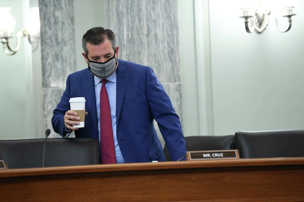 Sen. Ted Cruz wears a protective mask while arriving to a Senate Commerce, Science and Transportation Committee hearing in Washington, D.C., on Wednesday, June 24, 2020. Cruz was photographed without a mask while on board a plane recently.