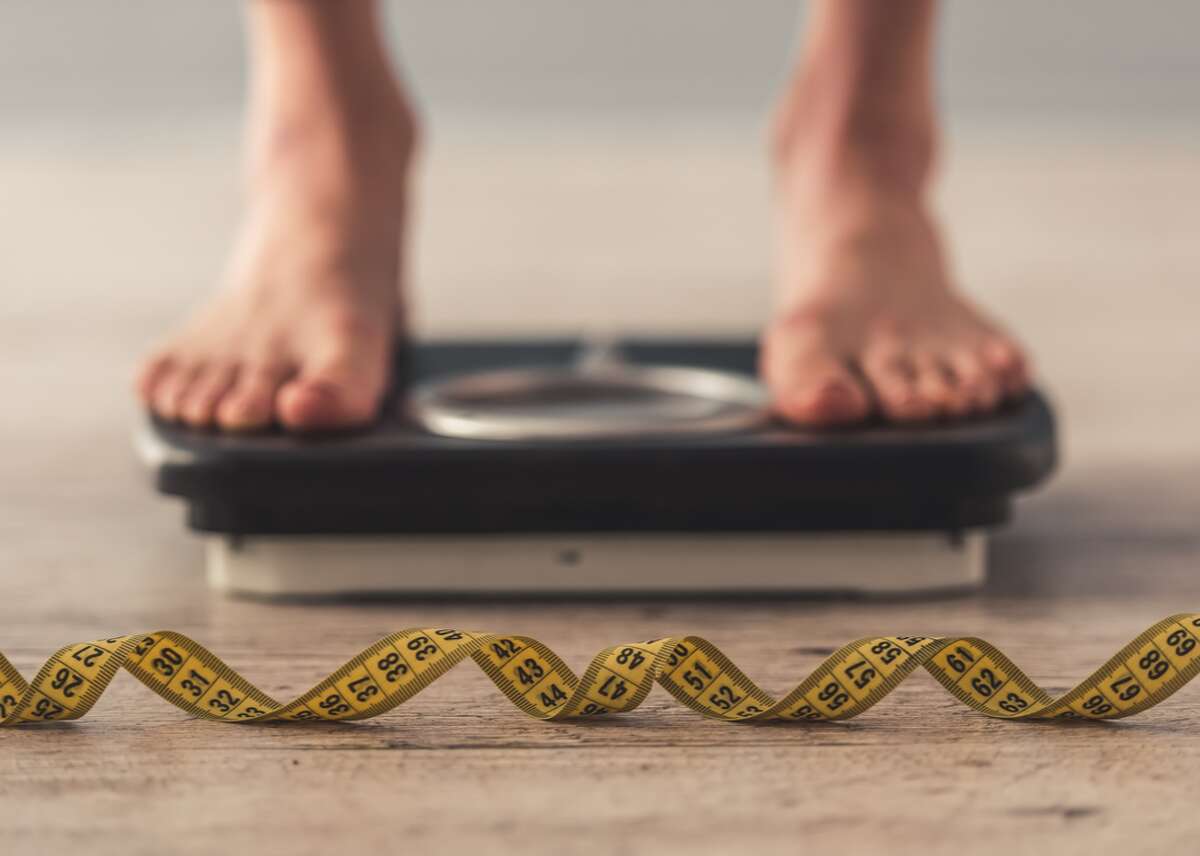 Overweight and obesity are defined by a person’s body mass index, a ratio of an individual’s weight and height. People with a BMI between 18.5 and 24.9 are considered to be of healthy weight; the overweight zone ranges from a BMI of 25 through 29, and obesity starts at a BMI of 30.