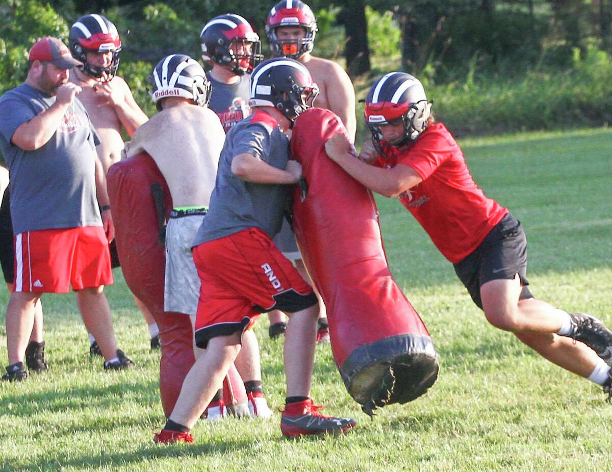 Reed City football players work out during a preseason practice last year. The MHSAA on Friday said it will continue with plans for a fall season with the possibility of changes depending on the situation with the COVID pandemic. (Pioneer file photo)