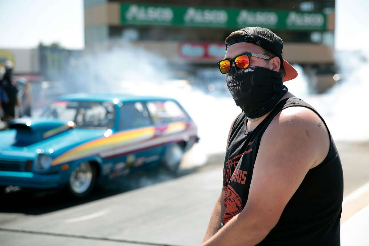 A crew member watches a race during the Pacific Division Lucas Oil Drag Racing Series at the Sonoma Raceway in Sonoma, California, Saturday, July 18, 2020. Ramin Rahimian/Special to The Chronicle