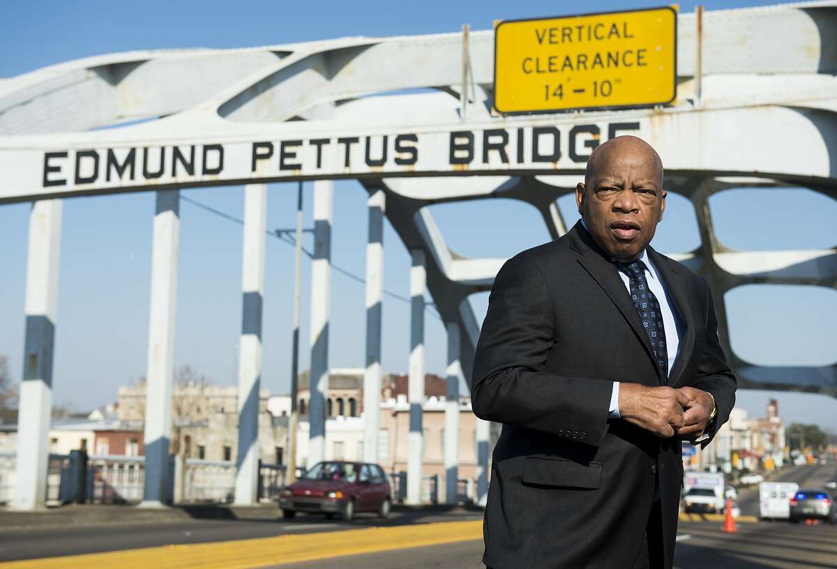 UNITED STATES - FEBRUARY 14: Rep. John Lewis, D-Ga., stands on the Edmund Pettus Bridge in Selma, Ala., in between television interviews on Feb. 14, 2015. Rep. Lewis was beaten by police on the bridge on "Bloody Sunday" 50 years ago on March 7, 1965, during an attempted march for voting rights from Selma to Montgomery. (Photo By Bill Clark/CQ Roll Call)