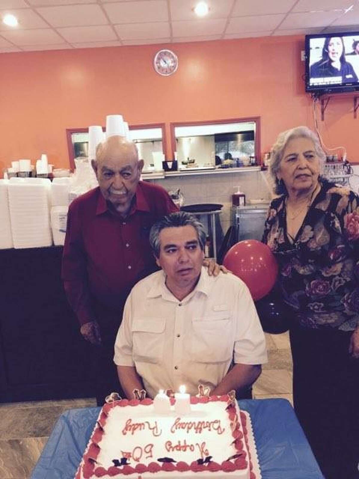 Alfonso Rodriguez and Porfiria Rodriguez celebrate their son Rudy's birthday.