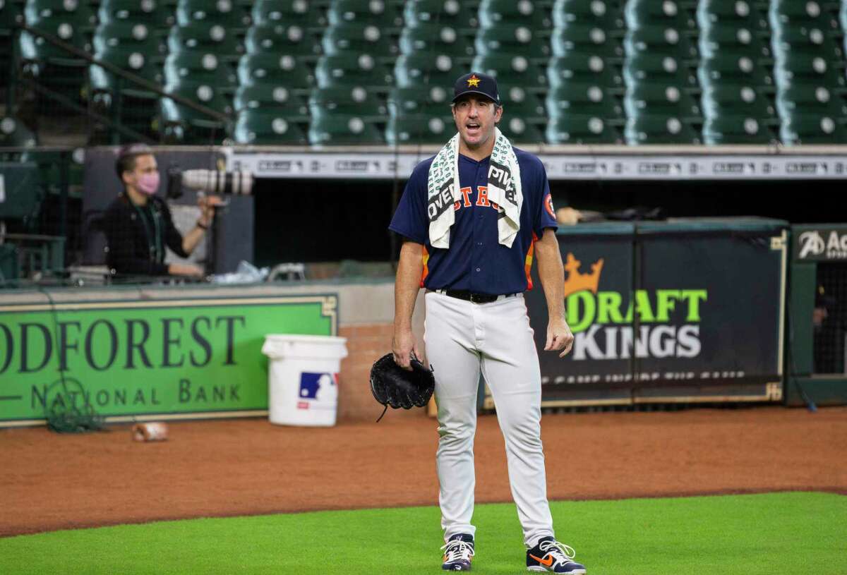 Houston Astros pitcher Justin Verlander walks toward the dugout after pitching five innings of an intrasquad game before heading to Kansas City for two exhibition games Sunday, July 19, 2020, at Minute Maid Park in Houston.