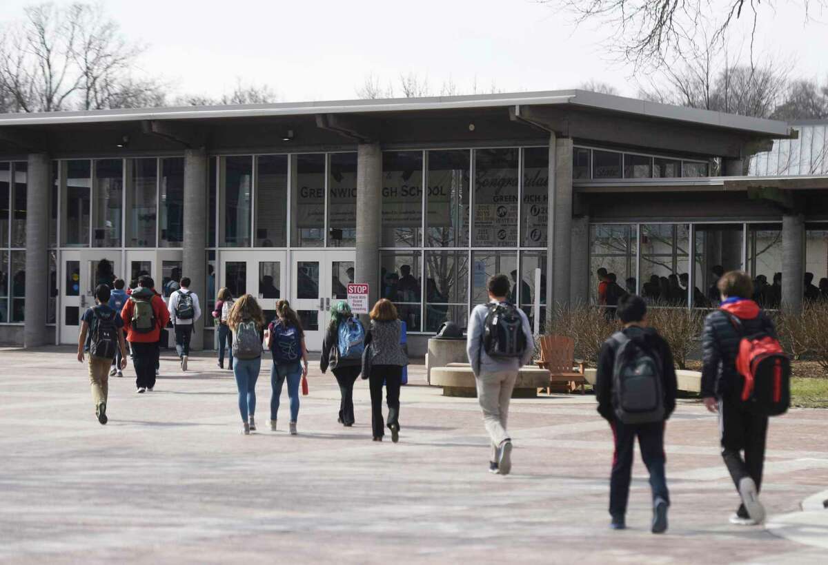Students enter Greenwich High School on Feb. 27, 2017.