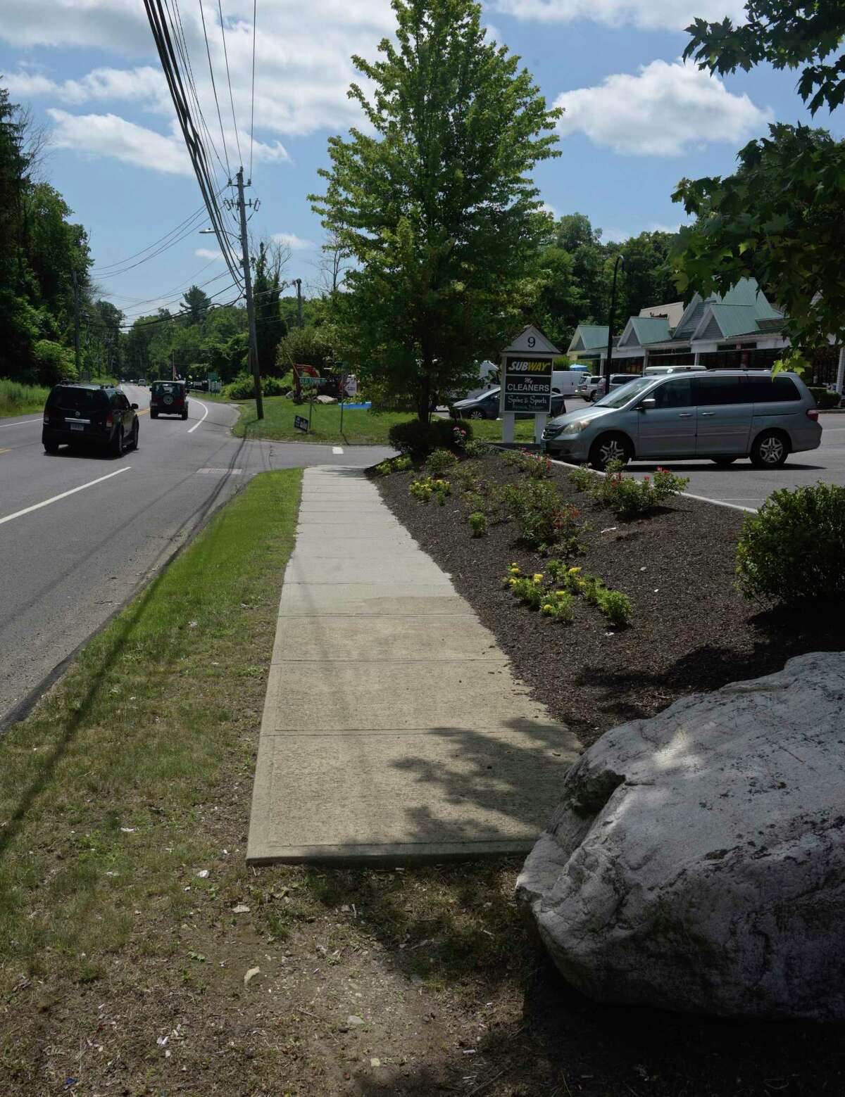 An existing section of sidewalk in Branchville. To make Branchville more walkable and inviting, town and state planners have been working on a $2.3 million plan that includes new sidewalks, street lamps and landscaping, as well as a redesigned highway intersection. Monday, July 20, 2020, in Ridgefield, Conn.
