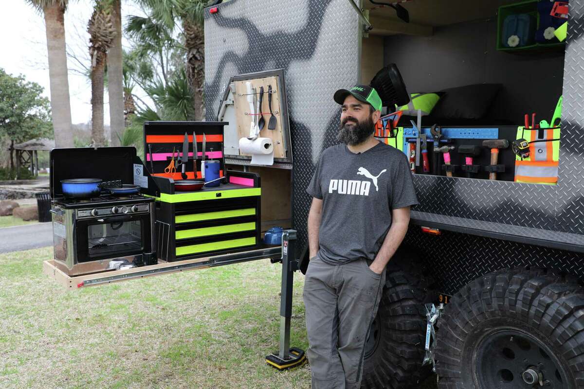 Buster Graybill’s said he liked the contrast of his raw survival trailer parked in front of the stately modern art museum.
