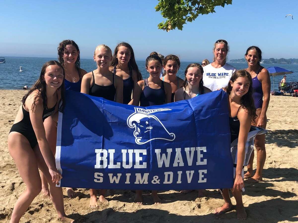 The Darien High School swimming team organized an open water swim this past Saturday at Weed Beach in Darien to raise money for Swim Across America Fairfield. The organization raises funds for cancer research.