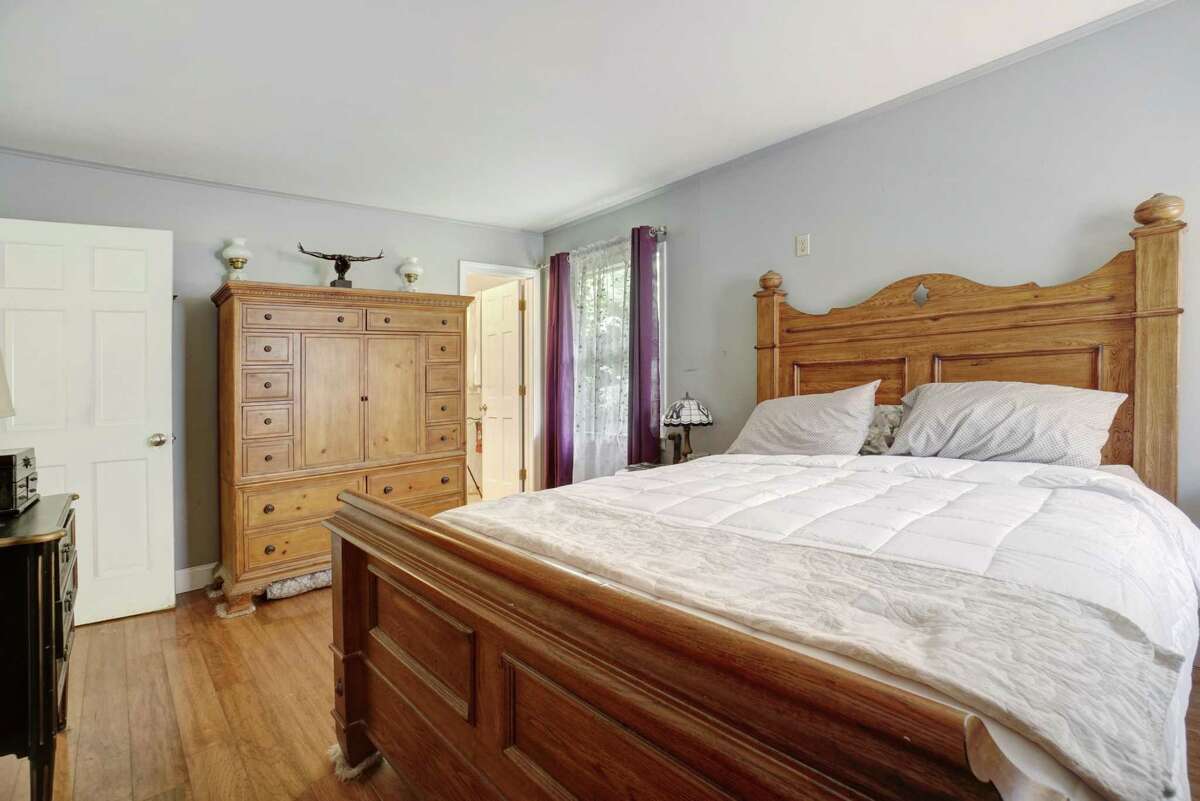 This house has three bedrooms including the master suite on the main living level. Also on the main floor are the master bedroom suite and a second bedroom. The third bedroom is found on the fully renovated lower level. This finished space is currently set up as a recreation room but it features enough space, and a full bath, to create an in-law or au pair suite with a living area, bedroom, home office with the fireplace, and a stereo cubby.