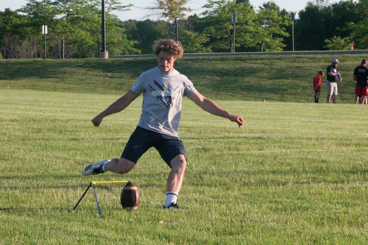 Big Rapids' Sam Alley works on his placekicking during a summer conditioning workout. (Pioneer photo/John Raffel)