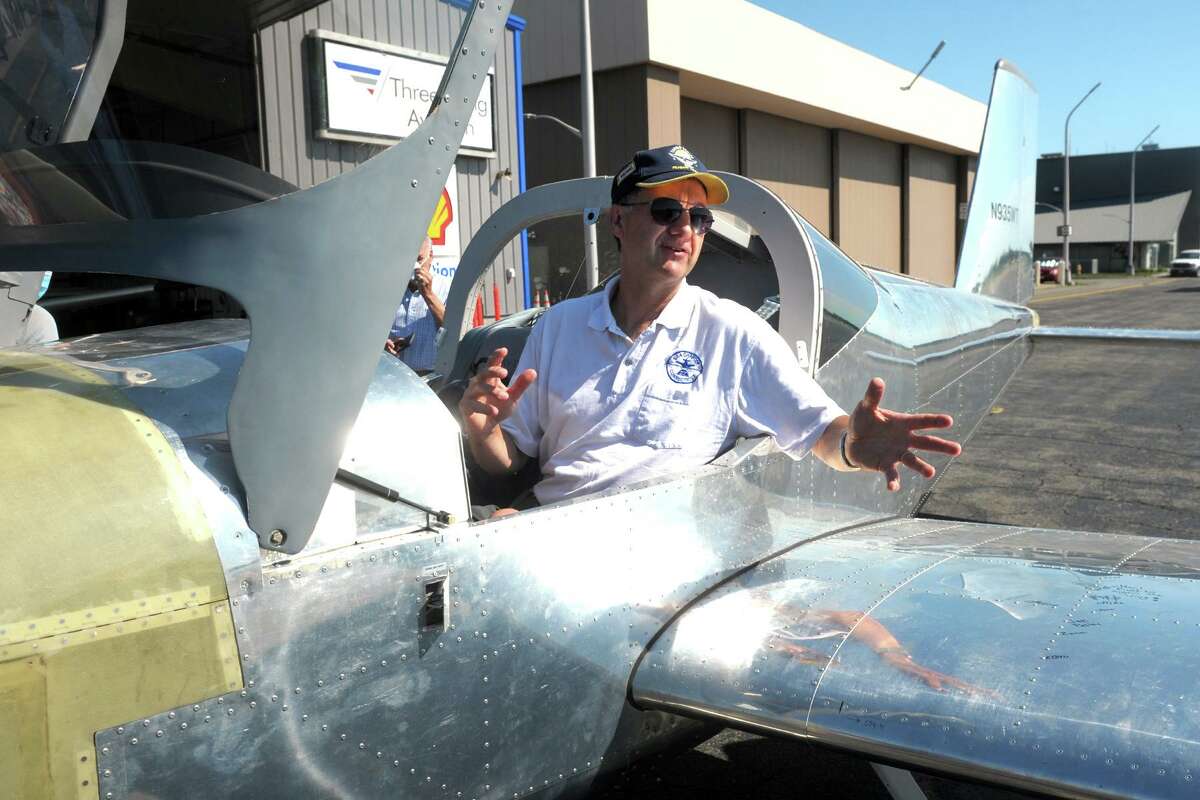 Pilot Mark Scott of the Spirit of Meriden Flight Club sits in the cockpit of a RV-12 airplane after landing at Sikorsky Memorial Airport, in Stratford, Conn. July 21, 2020. Industrial manufacturing students from Bassick High School, in Bridgeport, will soon begin building a RV-12. The Meriden club’s airplane was also built by high school students.