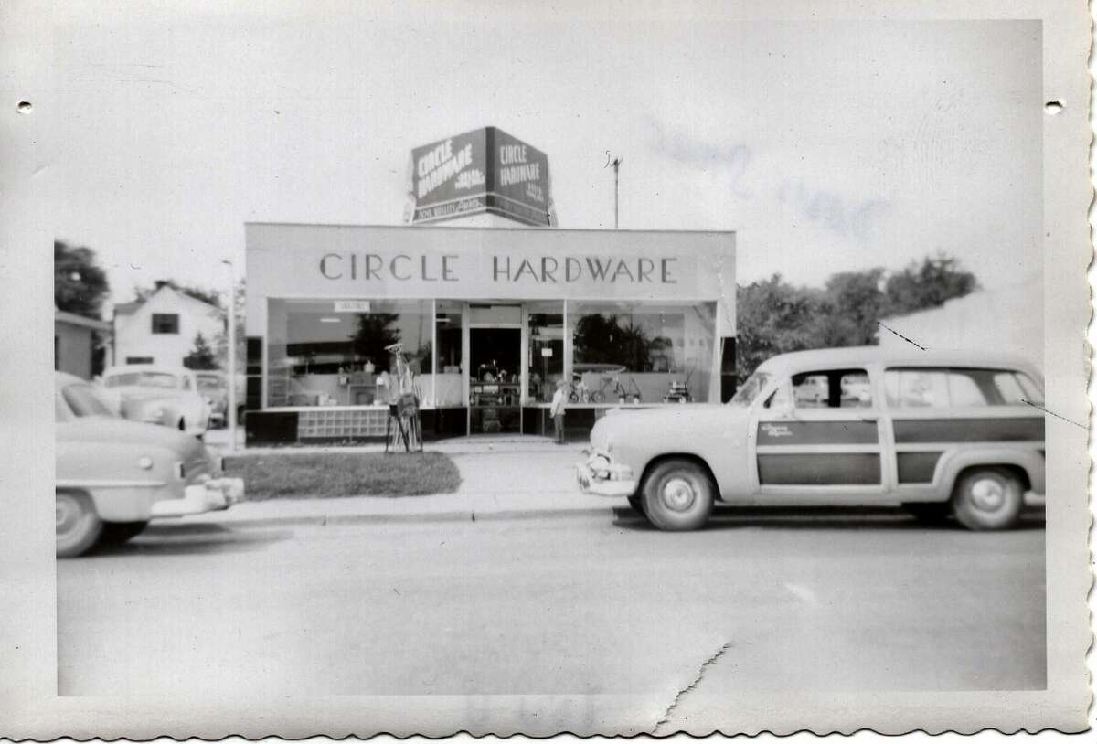 Reader Bruce Groom submitted this photo: My parents, Mel and Zena Groom, owned and operated the Circle Hardware between 1947-1959.  It was located at 160 Ashman Circle at the site now occupied by the Plaid Giraffe.  To the left of the building, Don Otway operated Otway Autos.  The site on the right was then vacant.  A new structure has since been built on it. (He said the photo was probably from the early 1950s.)