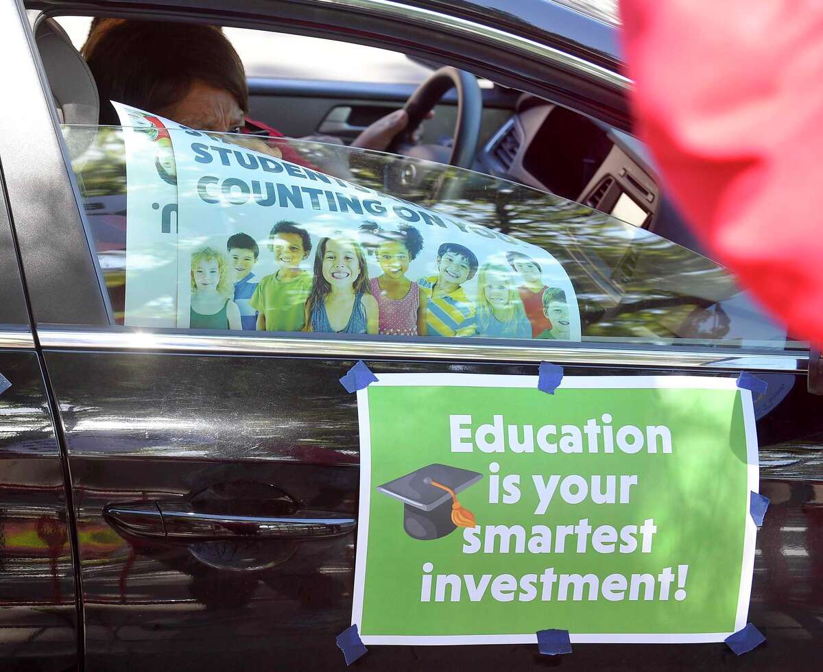 A rolling rally caravan was held around the Stamford Government Center on May 21, 2020, in a unified show of support to urge city officials to fund Stamford schools and not impose more than $15 million in cuts to education, which they say would be devastating to students, especially during the coronavirus pandemic.