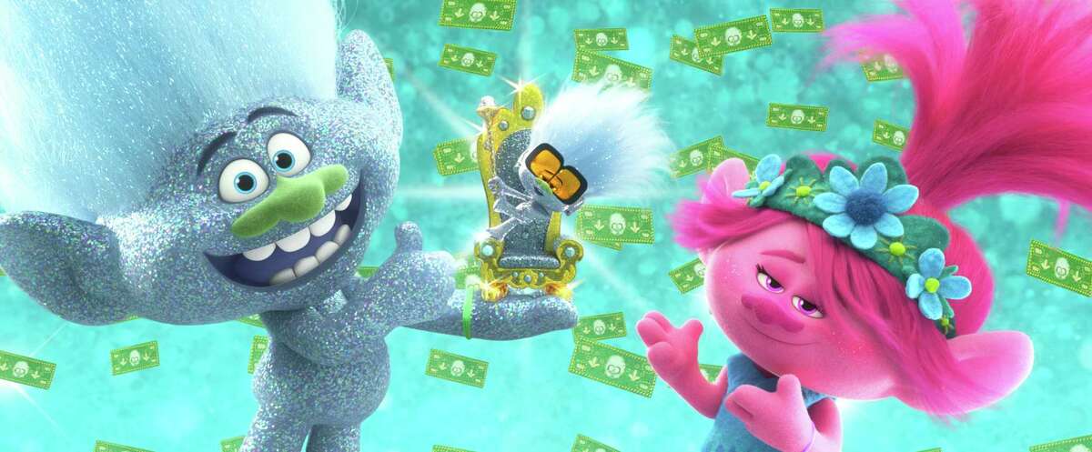 This image released by DreamWorks Animation shows characters, from left, Guy Diamond, voiced by Kunal Nayyar, Tiny Diamond, voiced by Kenan Thompson and Poppy, voiced by Anna Kendrick in a scene from