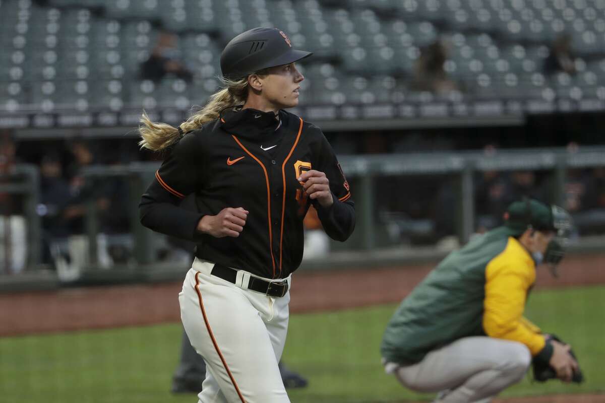 SF Giants coach Alyssa Nakken makes history coaching first base