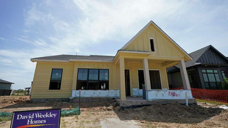 A home by David Weekley Homes is shown under construction in Bridgeland in Cypress. Weekley ranked No. 8 on the Chronicle 100’s list of private companies