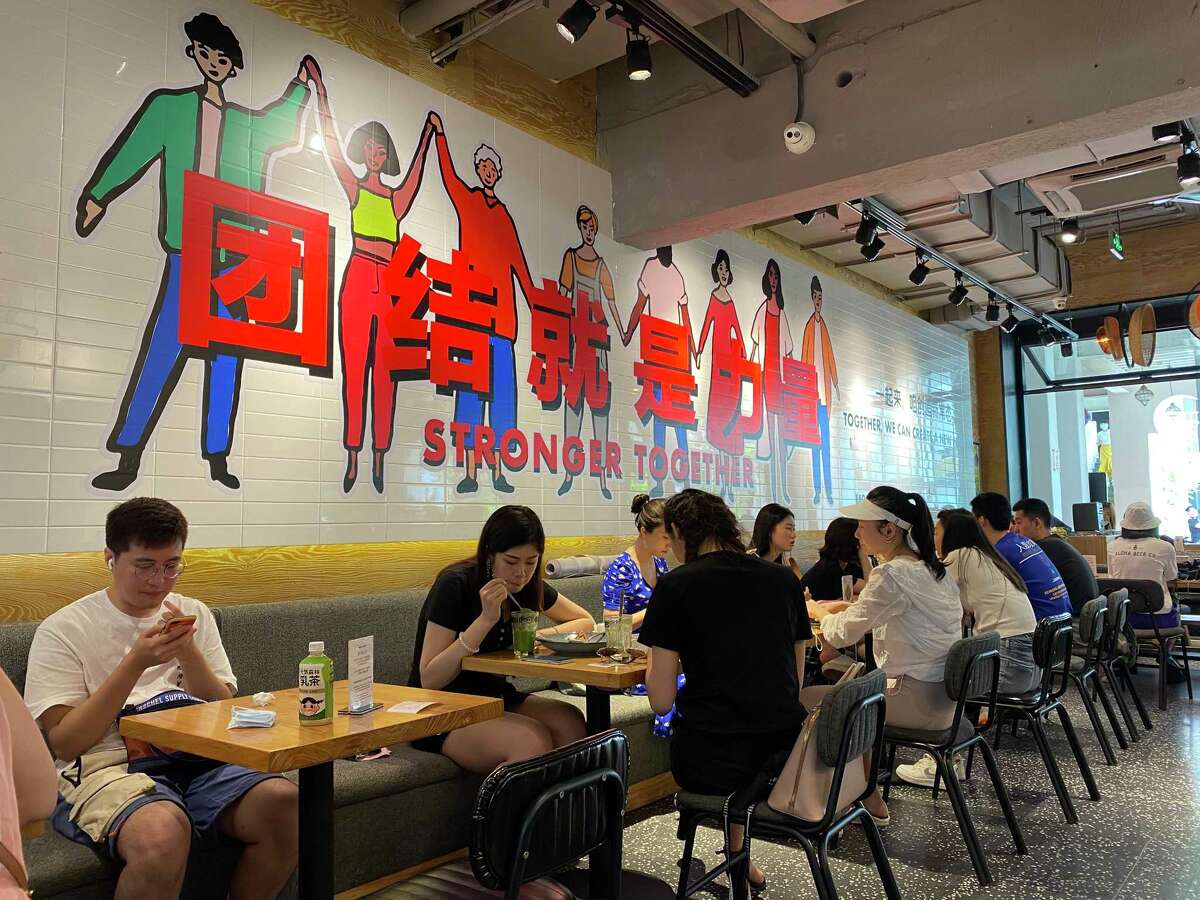 Cafes and restaurants in Beijing are operating almost as before. Many businesses require registration or health codes, but otherwise they operate normally.