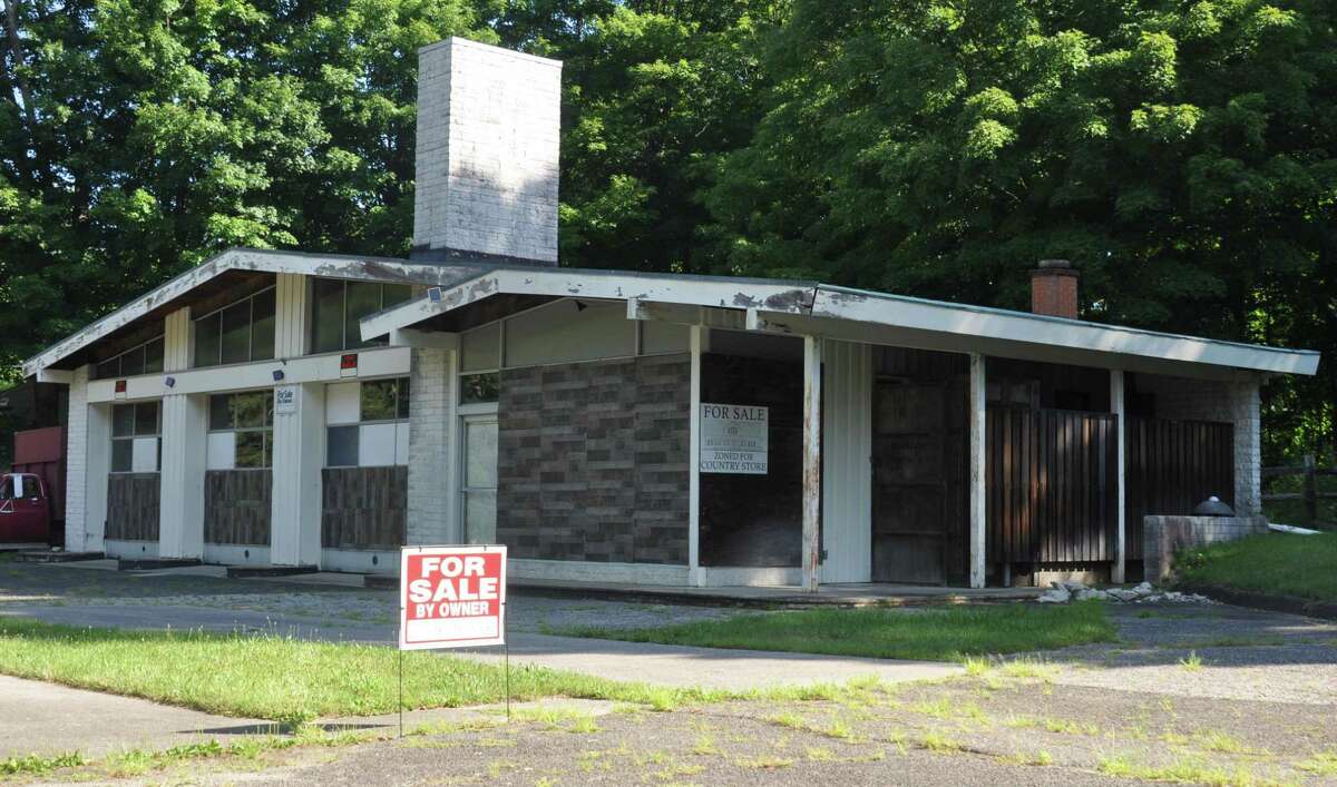 The gas station on Wilton Road West in the middle of a residential area has been empty for years, and is being offered for sale.