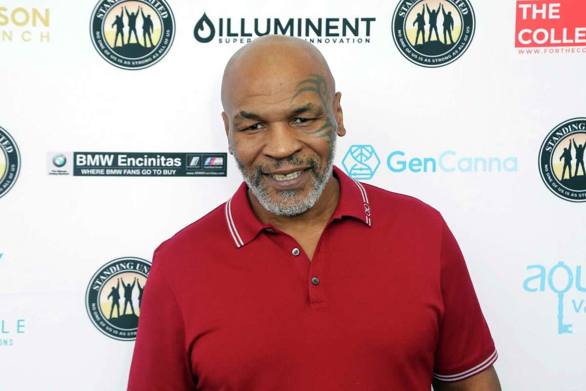 FILE - In this Aug. 2, 2019, file photo, Mike Tyson attends a celebrity golf tournament in Dana Point, Calif. Tyson hasn't officially announced any plans to return to the ring, though he did suggest on an Instagram post he might make himself available for 3 or 4-round exhibitions if the price was right. (Photo by Willy Sanjuan/Invision/AP, File)