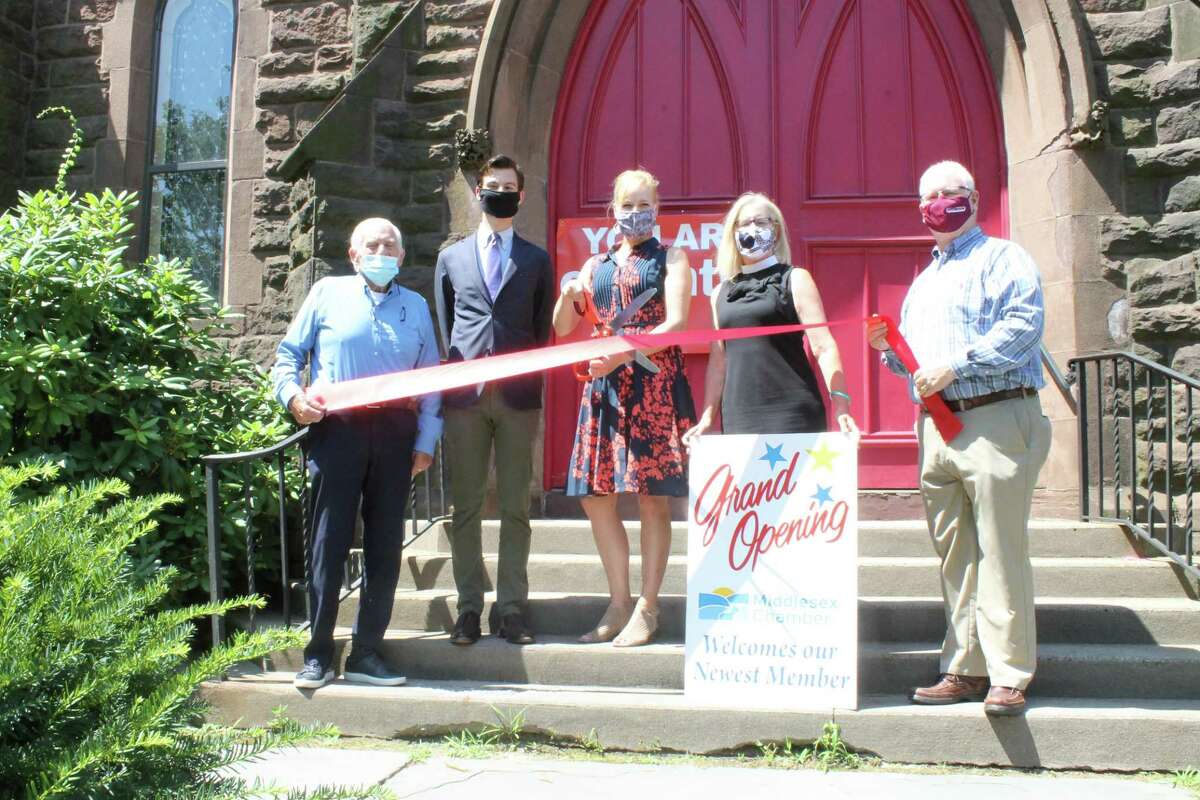 From left, Larry McHugh, president of the Middlesex County Chamber of Commerce, and Mayor Ben Florshiem recently joined others for the grand opening of Ekklesia Contemporary Ballet at the Church of the Holy Trinity on Main Street in Middletown.
