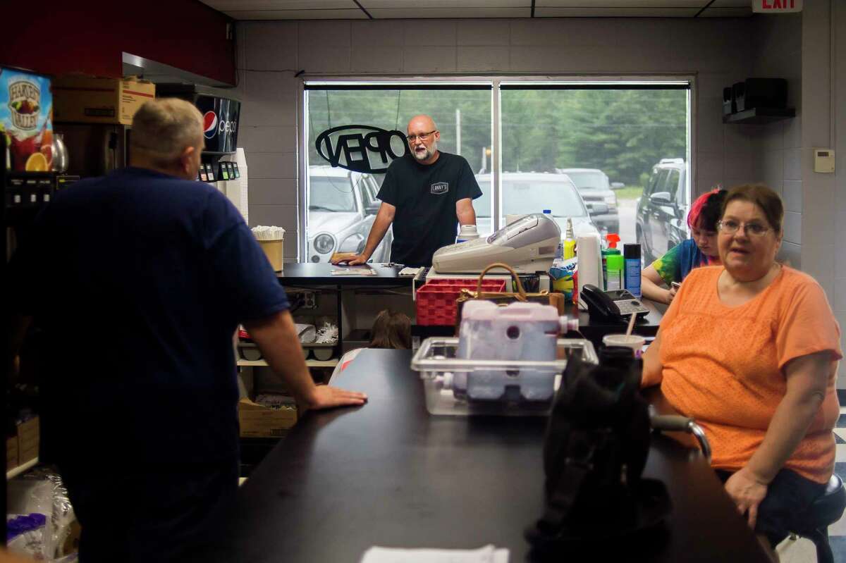 Lanny's Restaurant owner Ryan Such, center, chats with staff members inside the new Lanny's location Thursday, July 23, 2020 in Midland. The restaurant has relocated to 4312 N. Saginaw Road, in the building formerly housing Stacker's Grill, with a reopening being planned for mid-August. (Katy Kildee/kkildee@mdn.net)