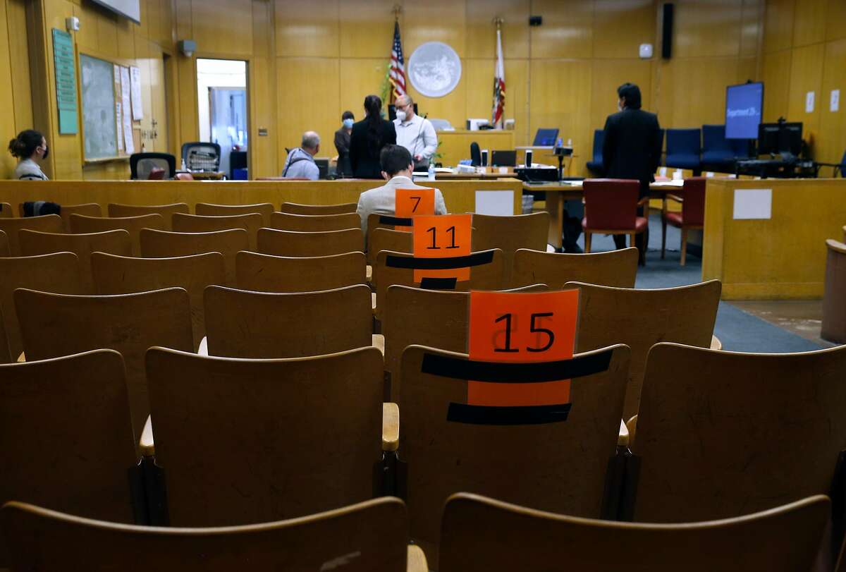 Seats are assigned and arranged to maintain social distancing in a courtroom at the Hall of Justice in San Francisco, Calif. on Thursday, July 16, 2020 before jury selection begins next week for the first criminal case to be tried during coronavirus pandemic.