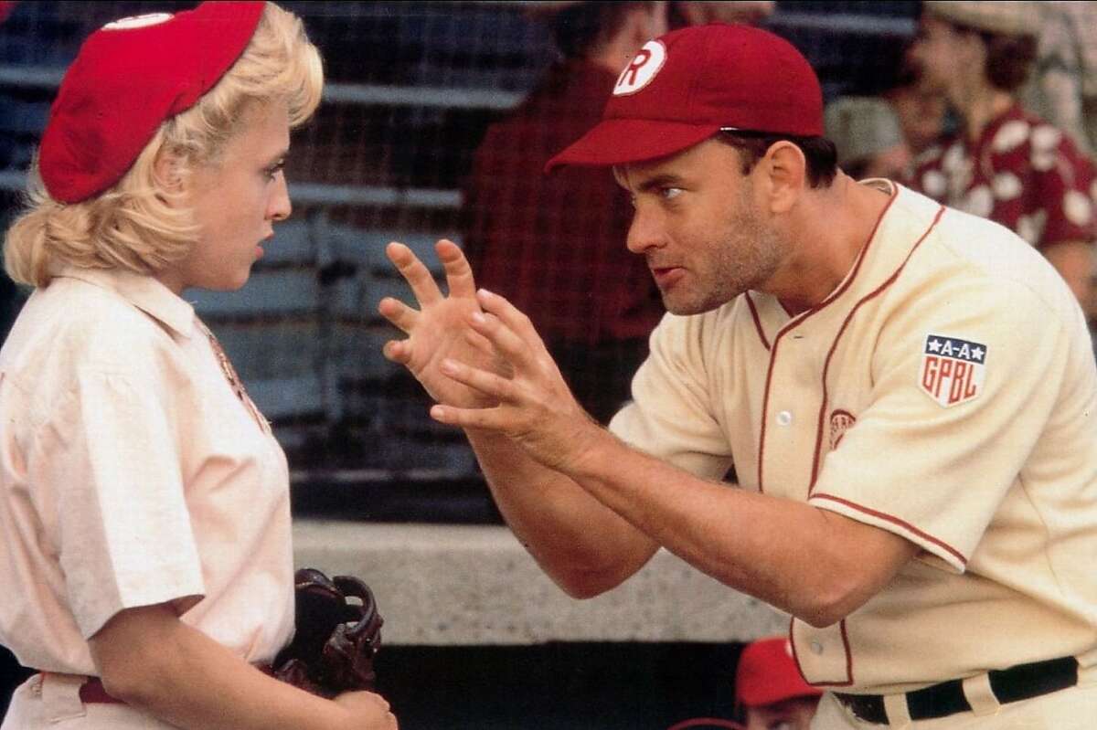 Tom Hanks (right) stars in “A League of Their Own” (1992).