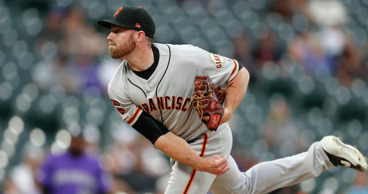 Sam Coonrod of the San Francisco Giants talks with Sam Coonrod on