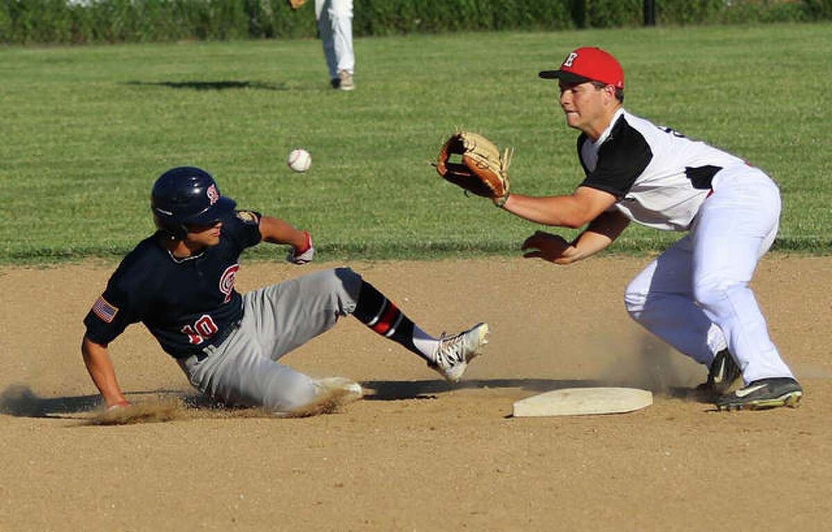 Alton’s Owen Macias (left) gets back to second base safely by beating the pickoff throw from the catcher to Elsberry’s second baseman in a June 11 game in Elsberry, Missouri.