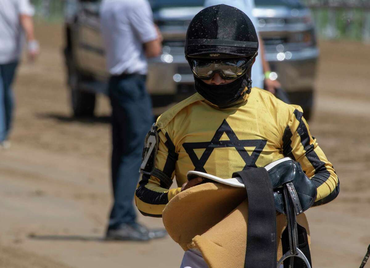 Jockey Luis Saez holds his tack after riding Movie Score on his first day back after a Corona Virus quarantine before riding at the Saratoga Race Course Friday July 24, 2020 in Saratoga Springs, N.Y. Photo by Skip Dickstein/Special to the Times Union.