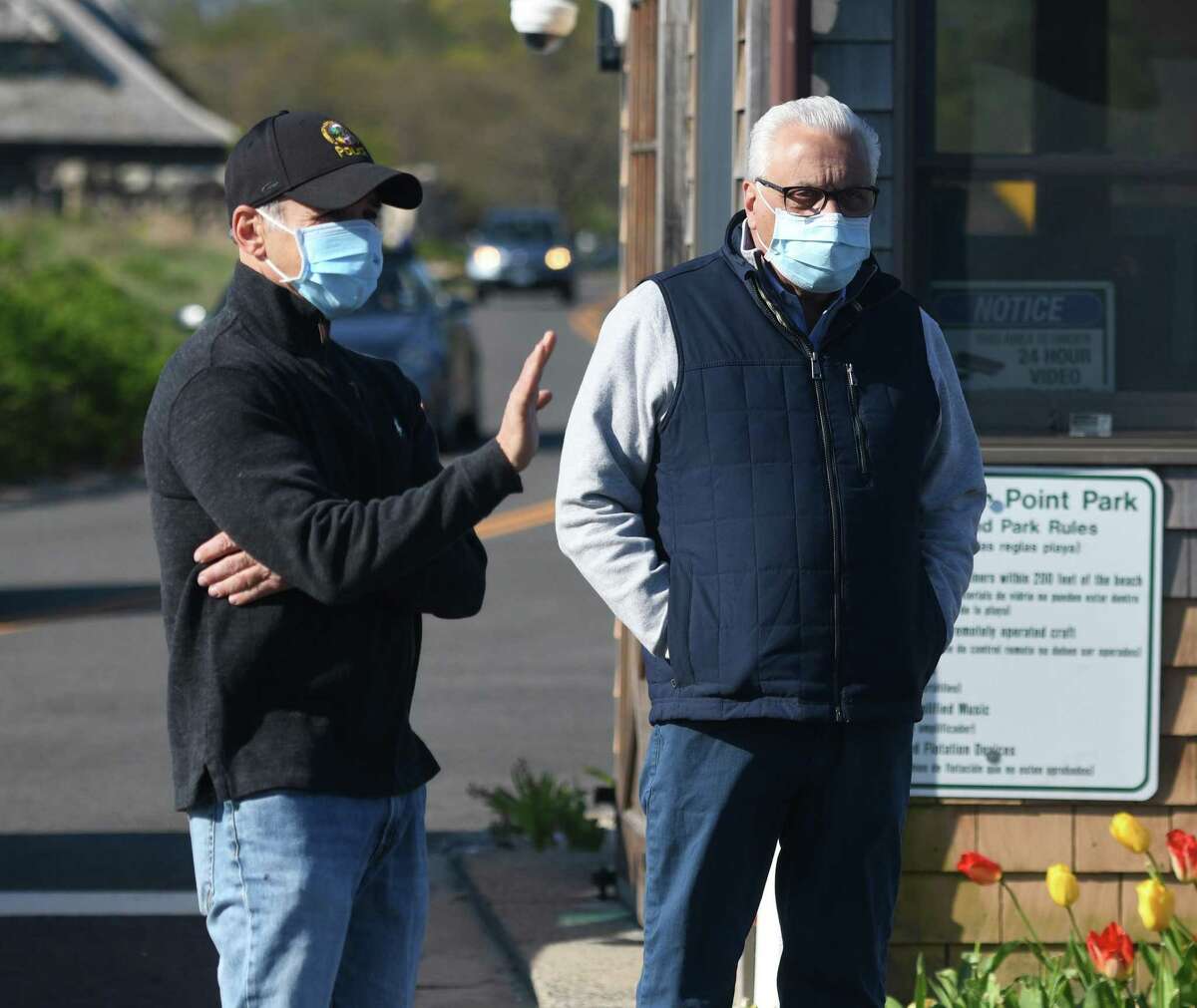 Greenwich First Selectman Fred Camillo, left, and Parks & Recreation Director Joe Siciliano hang out at the gate during the reopening of Greenwich Point Park in Old Greenwich, Conn. Thursday, May 7, 2020. After nearly six weeks of being closed, Tod's Point reopened that day to a line of about 30 cars ready to enter as the gate opened at 7 a.m.