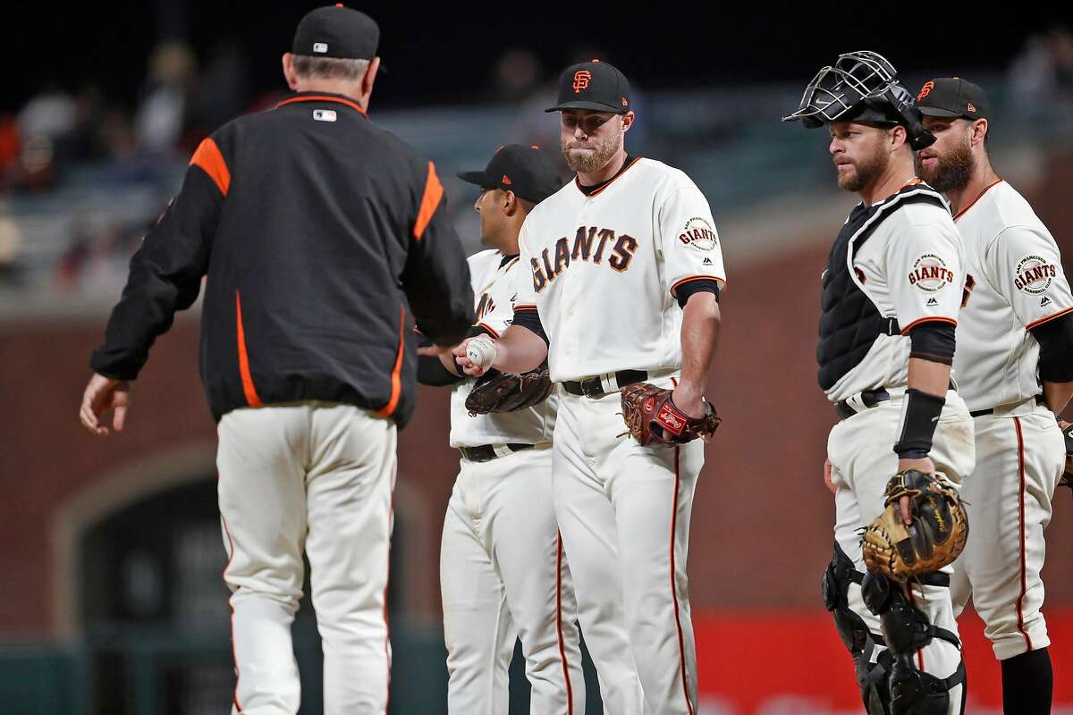 San Francisco Giants' manager Bruce Bochy removes Sam Coonrod in 6th inning against Arizona Diamondbacks in MLB game at Oracle Park in San Francisco, Calif., on Tuesday, August 27, 2019.
