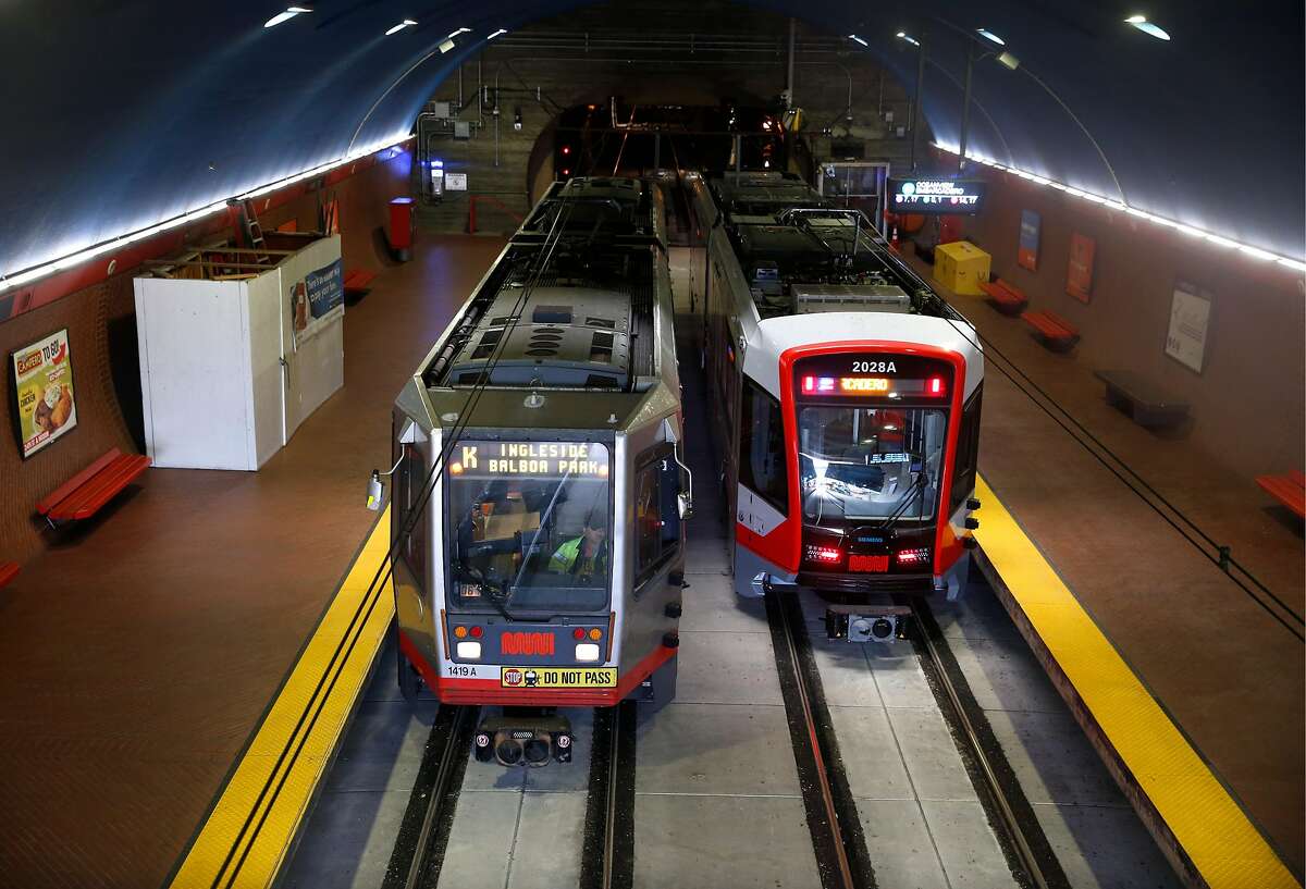Inbound and outbound Muni Metro light rail trains stop at the West Portal station in San Francisco, Calif. on Saturday, Aug. 25, 2018. The SFMTA reopened the Twin Peaks tunnel to light rail service Saturday following a two-month closure for an extensive restoration project.