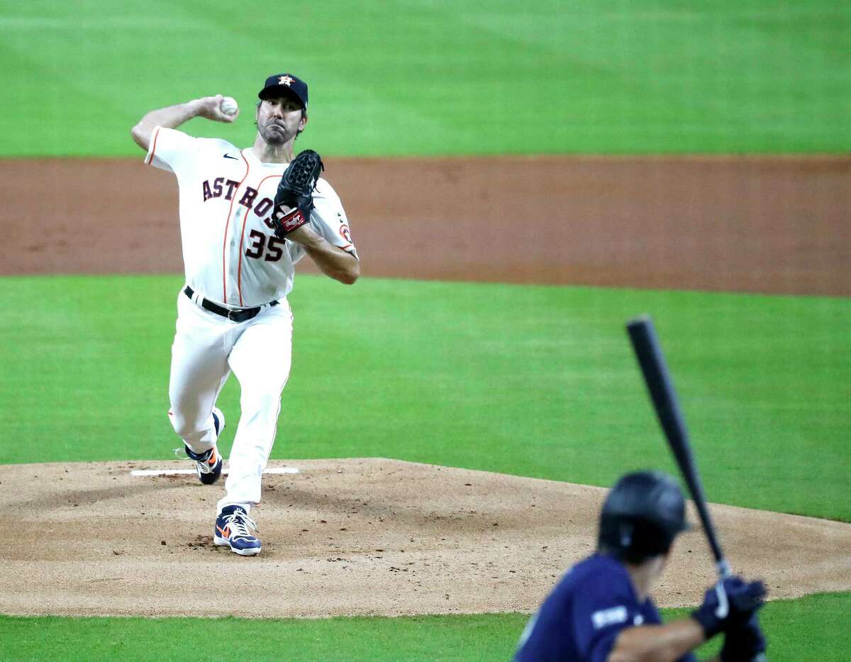 Houston Astros pitcher Justin Verlander pitches during the first inning an MLB Opening Day at Minute Maid Park, Friday, July 24, 2020, in Houston.