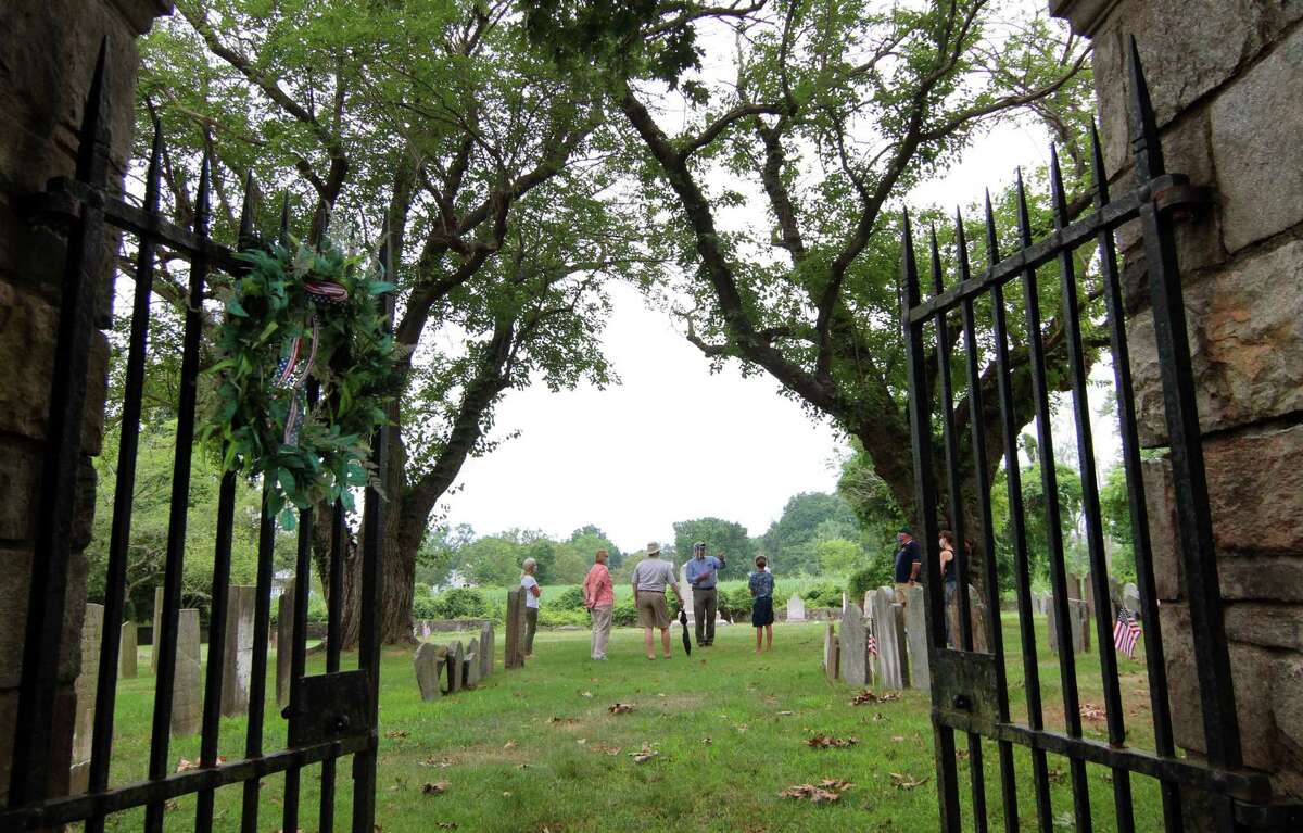 Fairfield Museum's holds Fairfield’s “Old Burying Ground” Walking Tour in Fairfield, Conn., on Wednesday July 22, 2020. Usually the tour is given once a month and on holidays, but this was the first tour given since the outbreak of the coronavirus pandemic.