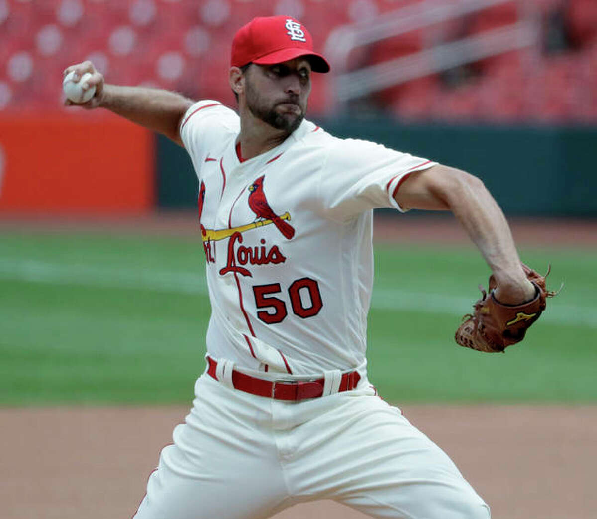 Cardinals starting pitcher Adam Wainwright throws during the fourth inning against the Pittsburgh Pirates on Saturday at Busch Stadium.