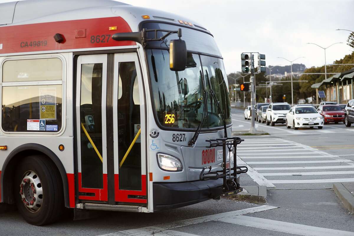 A MUNI bus turns onto 19th Avenue from Stonestown Galleria in San Francisco, Calif., on Thursday, April 9, 2020.