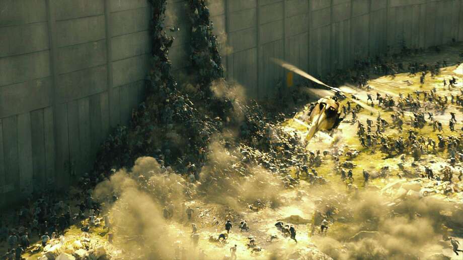 The infected scale the Israeli walls in a memorable scene from ‘World War Z.’ Photo: Photo Credit: MPC / Paramount Pi / MPC / Paramount Pictures / © 2013 Paramount Pictures.  All Rights Reserved.